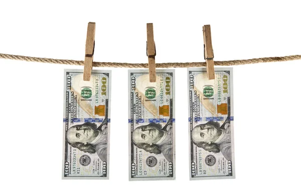 Dollars with a clothespin on a rope isolated on a white backgrou — Stock Photo, Image