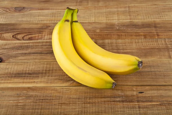 Bananas on a wooden background — Stock Photo, Image