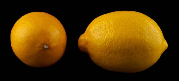 Lemon on a black background — Stock Photo, Image