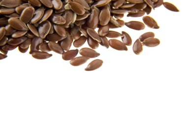 Beyaz arka plan üzerinde izole keten taneleri