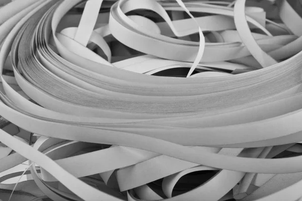 Tiras de papel cinza de redução — Fotografia de Stock