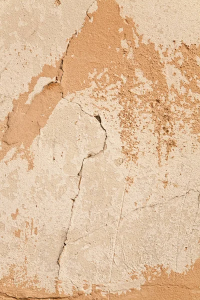 Mur beige avec une fissure comme fond — Photo