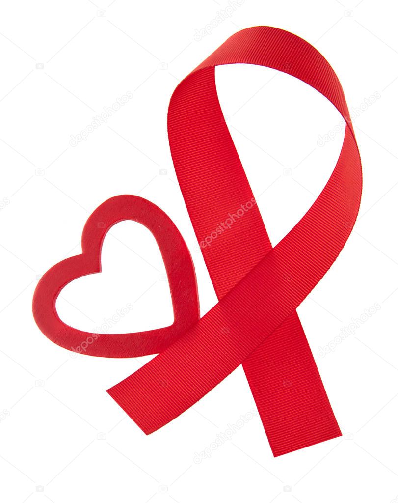 red ribbon and heart isolated on white background