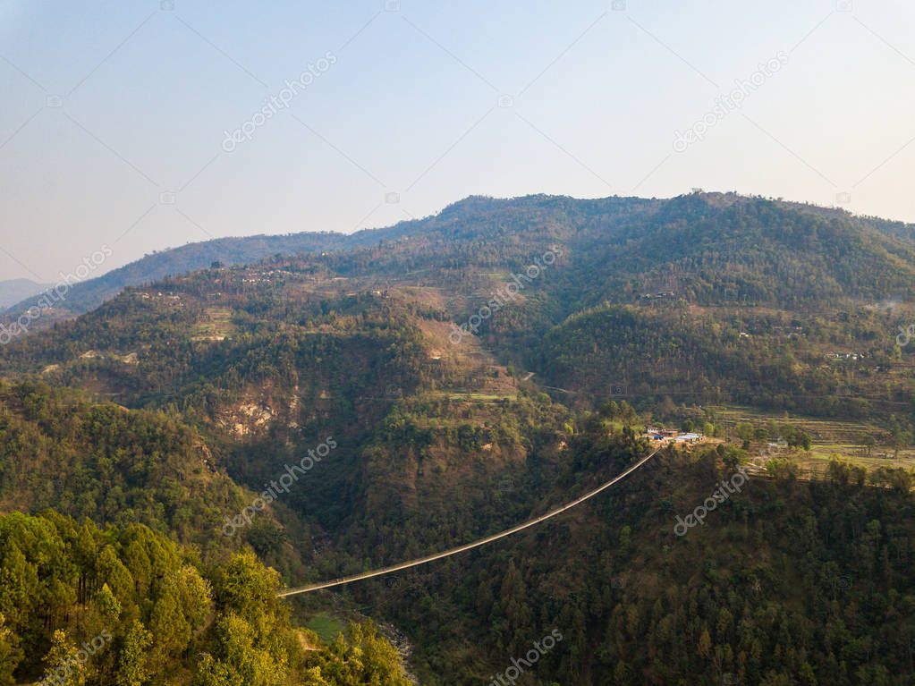 Drone view of suspension bridge in Nepal