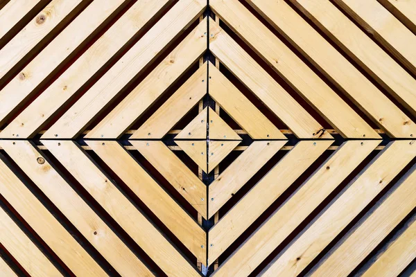 Symmetrical diamond background pattern with wood — Stock Photo, Image