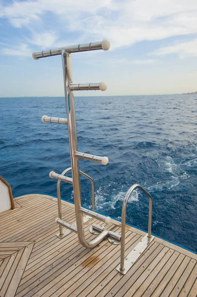 Ladders on the back of a luxury motor yacht — Stock Photo, Image