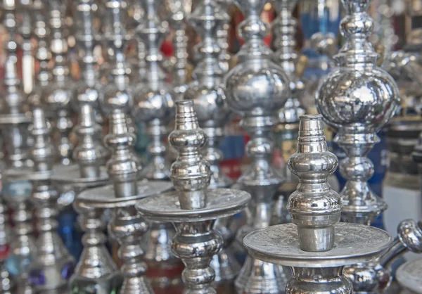 Rows of shisha water pipes in an egyptian market stall — Stock Photo, Image