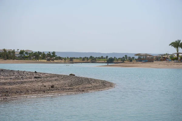 Tropical lagoon with small river and beach — Stock Photo, Image