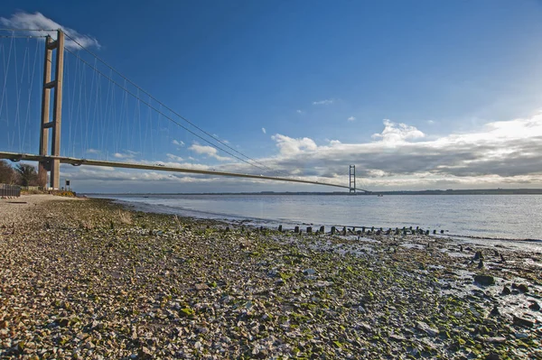 Large Suspension Bridge Spanning Wide River Estuary Clear Day Blue — Stock Photo, Image