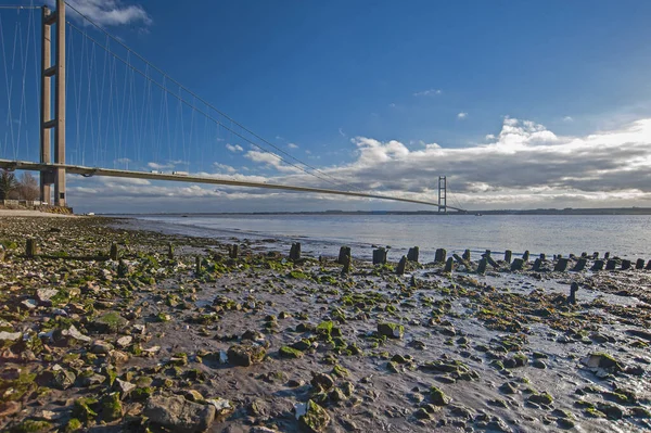Large Suspension Bridge Spanning Wide River Estuary Clear Day Blue — Stock Photo, Image