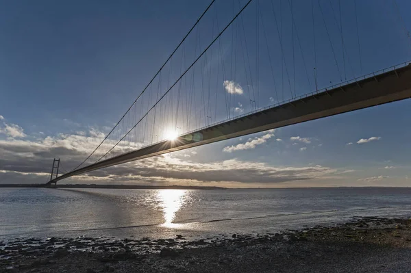 Large Suspension Bridge Spanning Wide River Estuary Clear Day Blue — Stock Photo, Image