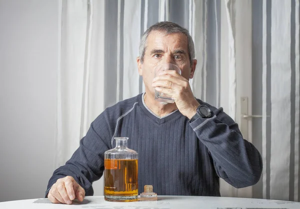 Lonely man with his bottle — Stock Photo, Image