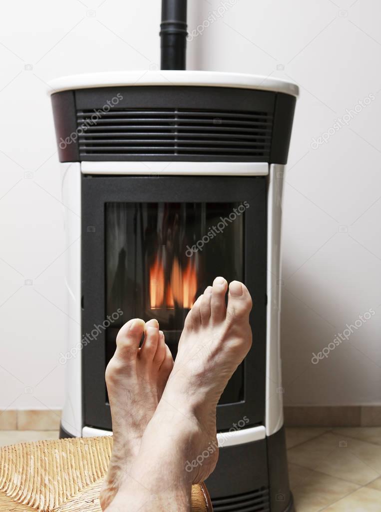 Feet warm in front of fire