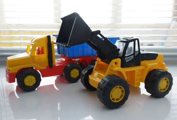 Toy Wheel Loader and Toy Dump Truck — Stock Photo, Image