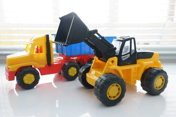 Toy Wheel Loader and Toy Dump Truck — Stock Photo, Image