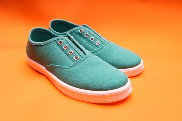 Green Sneakers on Orange — Stock Photo, Image