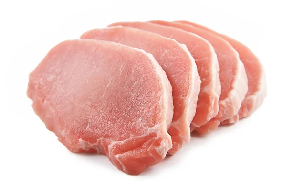 Fleisch, Schweinefleisch, Scheiben Schweinelende auf weißem Hintergrund lizenzfreie Stockbilder