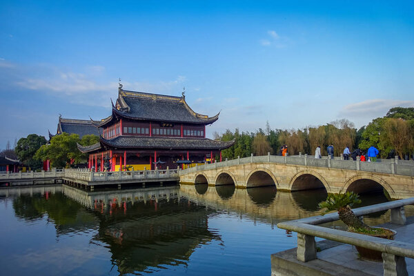 SHANGHAI, CHINA: Beautiful traditional chinese buildings located inside Zhouzhuang water town, ancient city district with channels and old buildings, charming popular tourist area