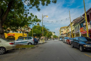 George Town, Malaysia - March 10, 2017: Little India enclave, where the oldest Hindu temple in Penang is located, Mahamariamman Temple, as well as where many indian shops and restaurants. clipart