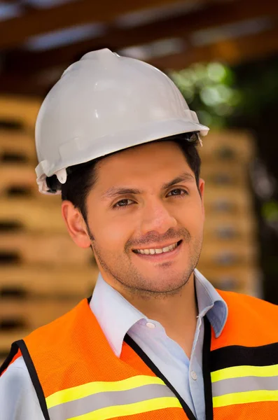 Handsome young engineer portrait at construction site — Stock Photo, Image
