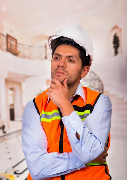 Engineer thinking at construction site — Stock Photo, Image