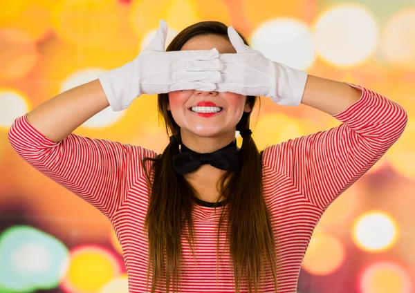 Closeup portrait of cute young girl clown mime covering her eyes — Stock Photo, Image