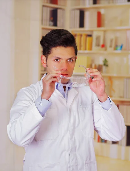 Handsome man wearing a work glasses with white coat — Stock Photo, Image