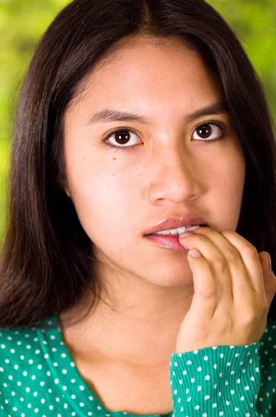 Closeup of an anxious girl bitting nails — Stock Photo, Image