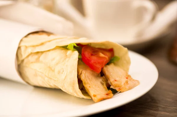 Delicious shawarma rolled sandwich with meat and vegetables — Stock Photo, Image