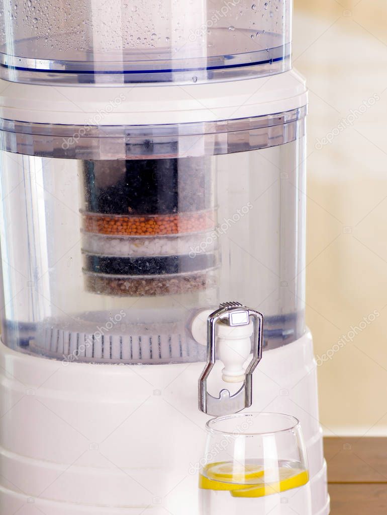 Close up of a filter system of water purifier on a kitchen background