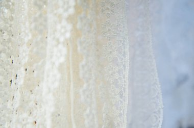 Otavalo, Ekvator - 17 Mayıs 2017: bir güzel and geleneksel Giyim Tekstil iplik ve dokuma yün, renkli kumaşlar arka plan elinde tarafından yakından