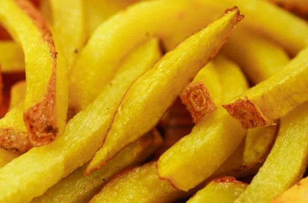 Närbild på en läcker och välsmakande pommes frites — Stockfoto