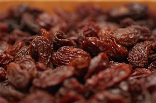 Délicieux raisins secs comme fond Raisin texture — Photo