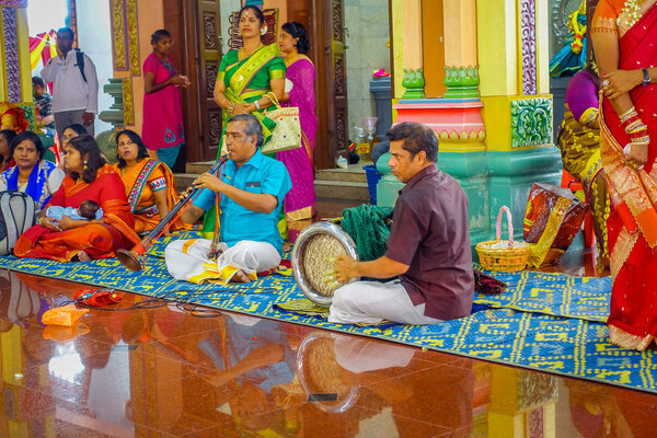 Kuala Lumpur, Malaysia - March 9, 2017: Unidentified people in a traditional Hindu wedding celebration. Hinduism is the fourth largest religion in Malaysia.