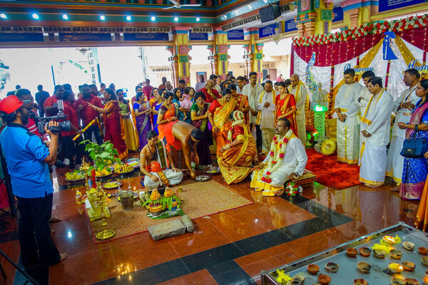 Kuala Lumpur, Malaysia - March 9, 2017: Unidentified people in a traditional Hindu wedding celebration. Hinduism is the fourth largest religion in Malaysia.