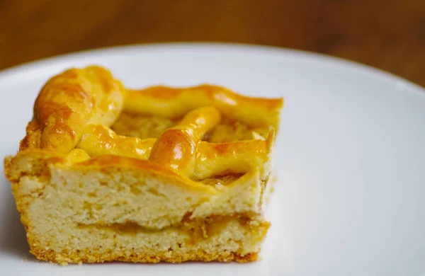 Delicious homemade pineapple cake over a white plate — Stock Photo, Image