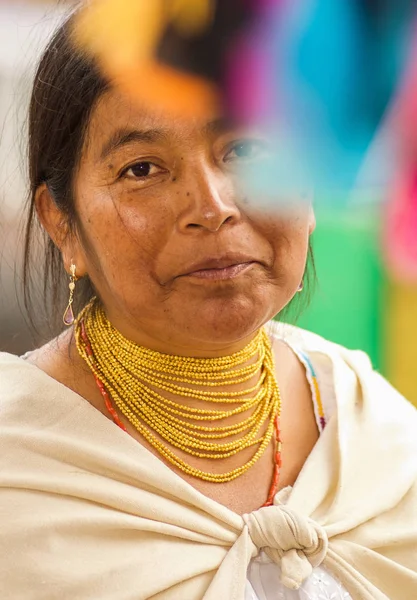 OTAVALO, ECUADOR - MAY 17, 2017: Close up of an unidentified hispanic indigenous woman wearing andean traditional clothing and necklace, posing for camera — Stock Photo, Image