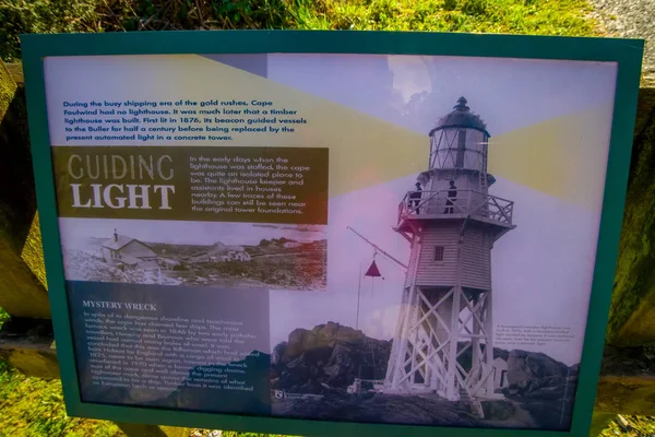 SOUTH ISLAND, NEW ZEALAND- MAY 23, 2017: An informative sign of the Lighthouse at Cape Foulwind, West Coast of South island, New Zealand — Stock Photo, Image