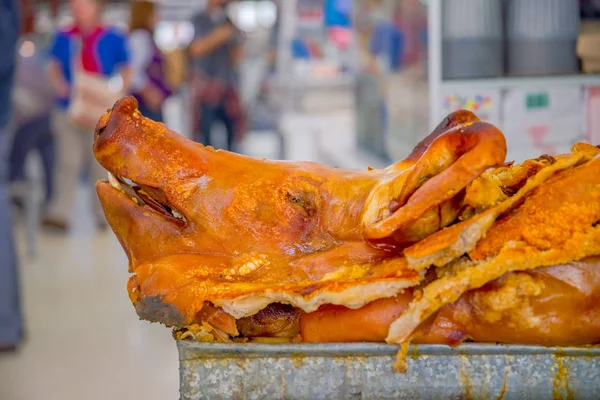Delicious hornado roasted pork, over a silver tray, ecuadorian traditional typical andean food located in the municipal market in San Francisco in the city of Quito — Stock Photo, Image