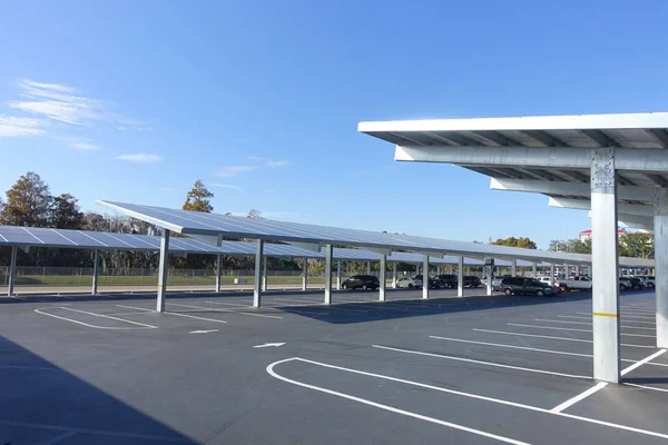 HOUSTON, USA - JANUARY 12, 2017: Some cars parked, with a solar panel protecting from the sun the cars in Legoland park, Legoland is a theme park based on the popular LEGO brand of building toys — Stock Photo, Image