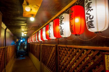 KYOTO, JAPAN - JULY 05, 2017: Beautiful paper lamps at night inside of a building in Gion DIstrict, Kyoto clipart