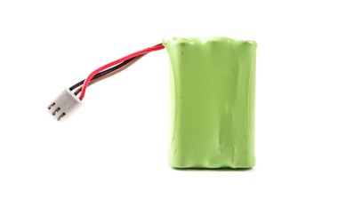 Yeşil plastik izole üzerinde beyaz bir arka plan ile kaplı pil