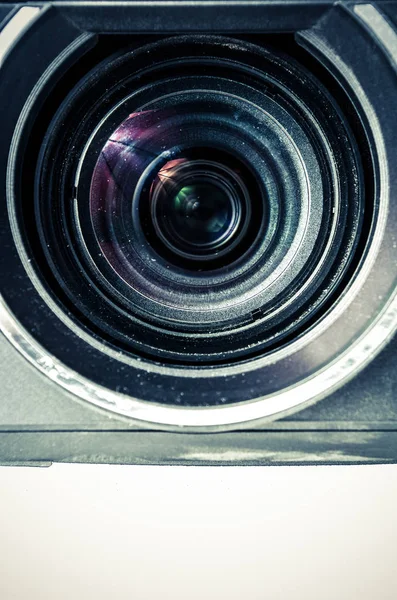 Close up view of a camera lens in a white background — Stock Photo, Image