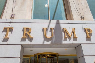 NEW YORK, USA - MAY 05, 2017: The Trump Building on Wall Street. In 1995 President Donald Trump bought the building that is now known as The Trump Building. clipart