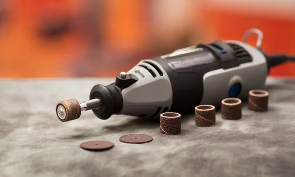 FERREX rotary tool, with Dremel accessories. 