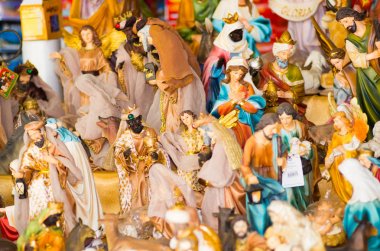 QUITO, ECUADOR- 07 MAY, 2017: Beautiful small figures of religious cluture made of clay clipart