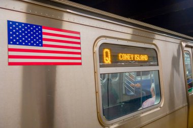 NEW YORK, USA - NOVEMBER 22, 2016: Times Square subway train moving underground in New York City USA clipart