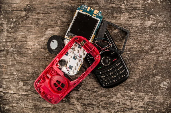 Quito, Ecuador, July 10, 2017: Close up of first generation mobile cellphone on wooden background — Stock Photo, Image