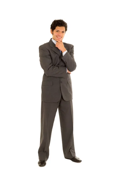 Volledige lengte van een knappe jonge man met krullend haar, het dragen van een mooi pak, en poseren op een witte achtergrond — Stockfoto