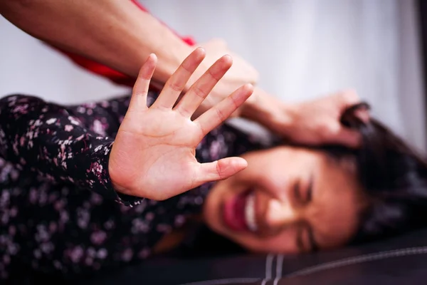 Close up mans hand holding a woman head over a black coach for rape and sexual abuse concept — Stock Photo, Image